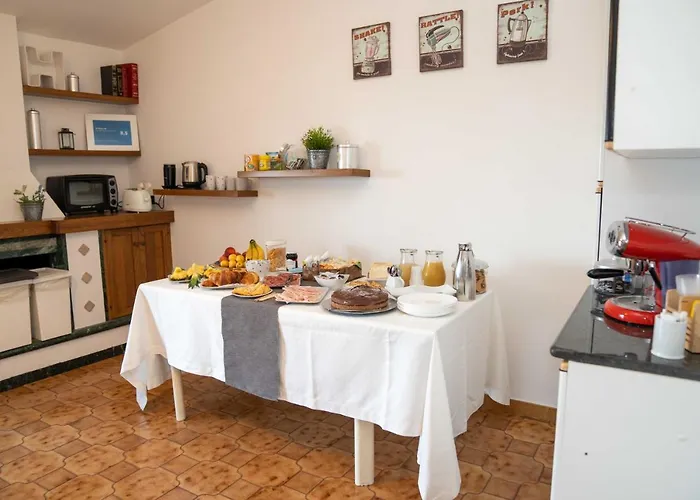 Queen's Alojamento de Acomodação e Pequeno-almoço Grisolia